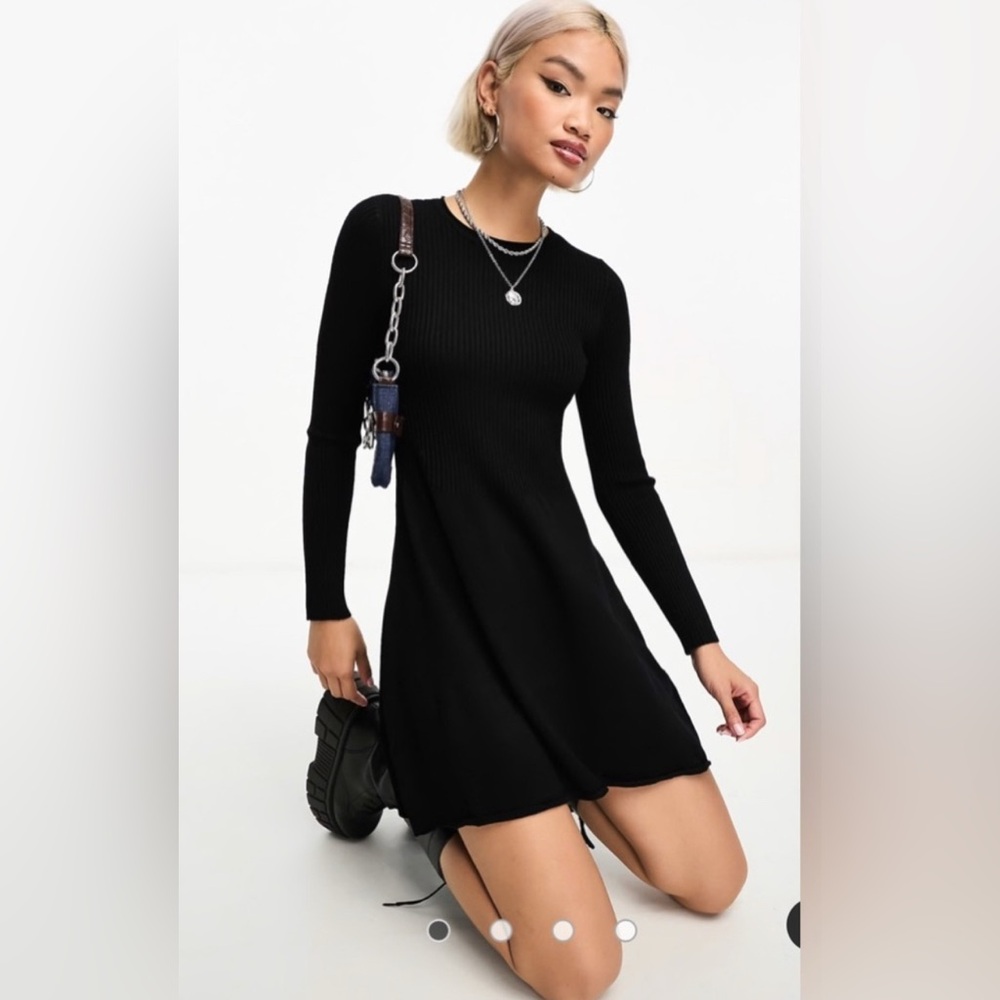 Elegant Black Ribbed Knit Dress with Bell Sleeves